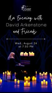 David Arkenstone at piano surrounded by candles